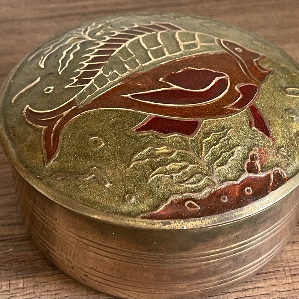 Brass and red trinket/container with fish decor